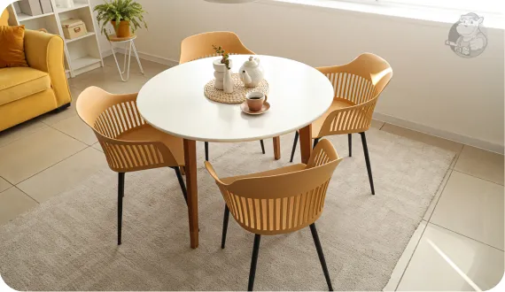 biały stół z modnymi krzesłami